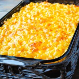 Golden Southern baked macaroni and cheese fresh out of the oven in a baking dish.